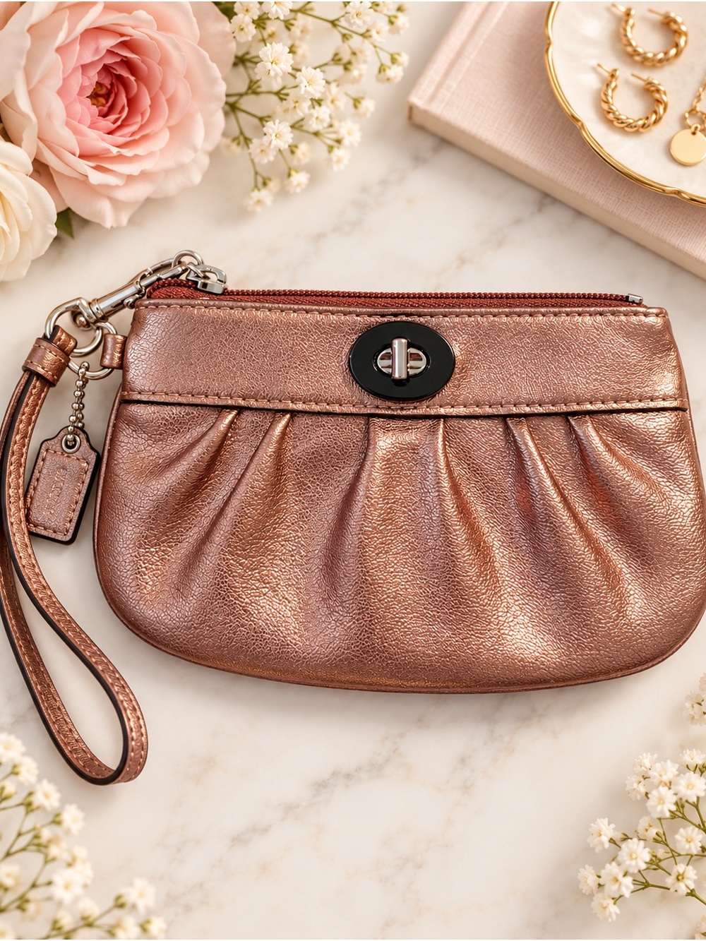COACH- Metallic Rose Gold Wristlet